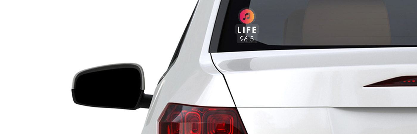 The car with the Life 96.5 sticker