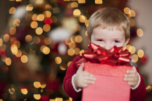 Little boy with a Christmas gift